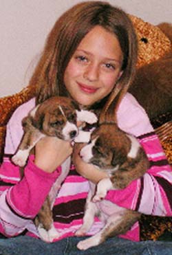 Meghann with basenji babies.